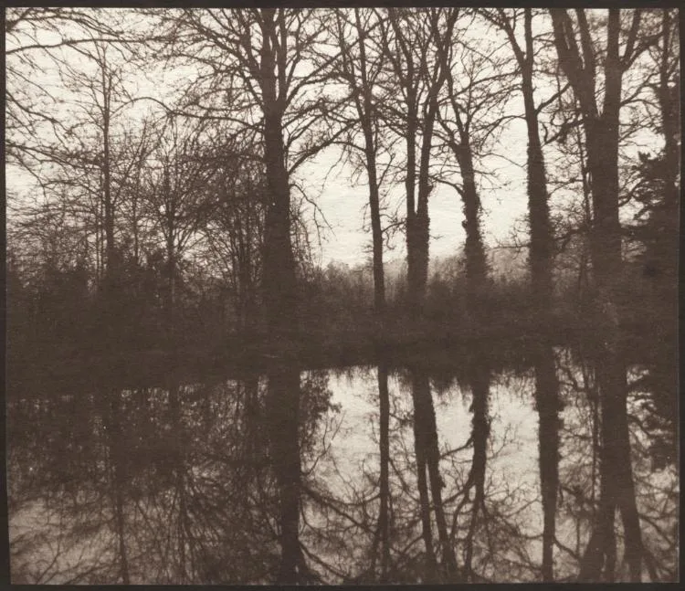 William Henry Fox Talbot, Winter Trees Reflected in a Pond, 1841 to 1842, salted paper print. Cleveland Museum of Art. Early photography produced exactly the soft, uneven detail that painters would later refuse to copy.