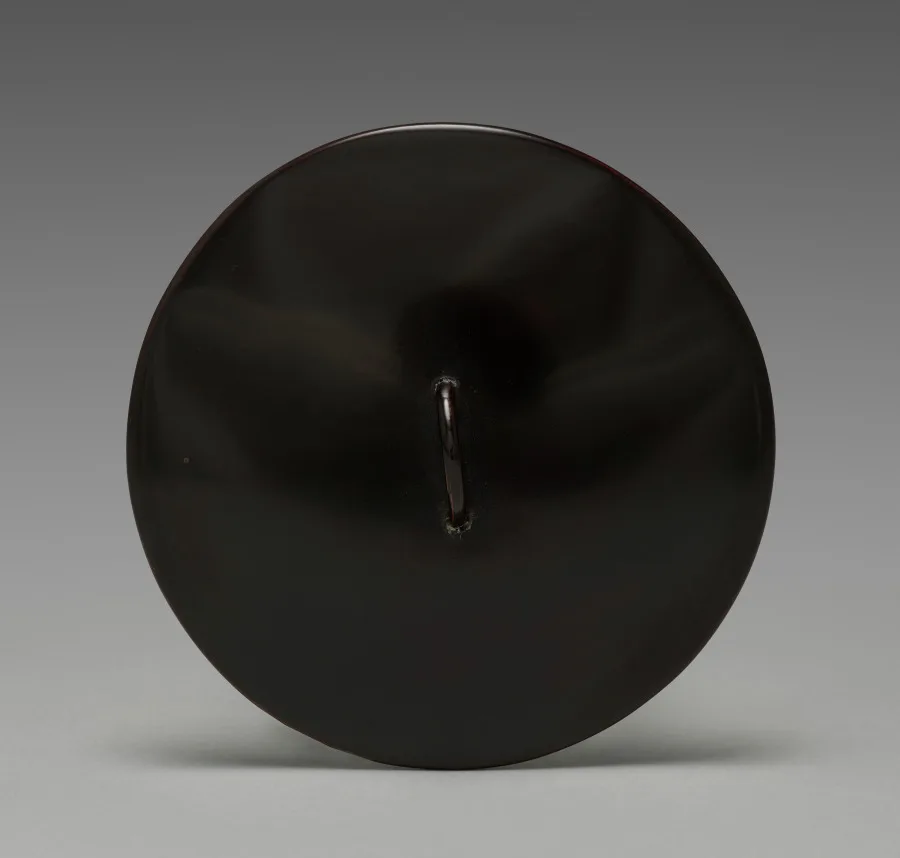 Seifū Yohei III, lid for a water container with peonies, 1900 to 1914, black lacquered wood. Cleveland Museum of Art. Lacquer and enamel traditions reward the same flat, saturated surface that Georgian painters favour.